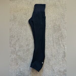 Size 4 Black Lululemon Crop leggings with mesh panels